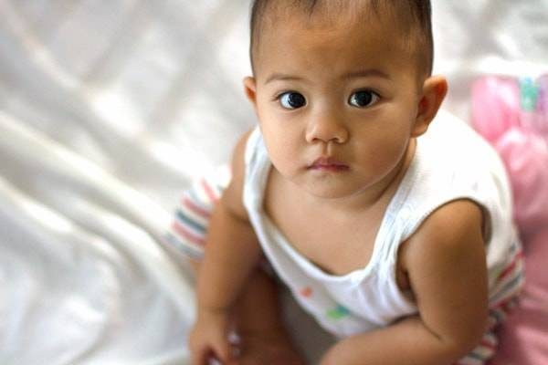 Young girl looking at camera.