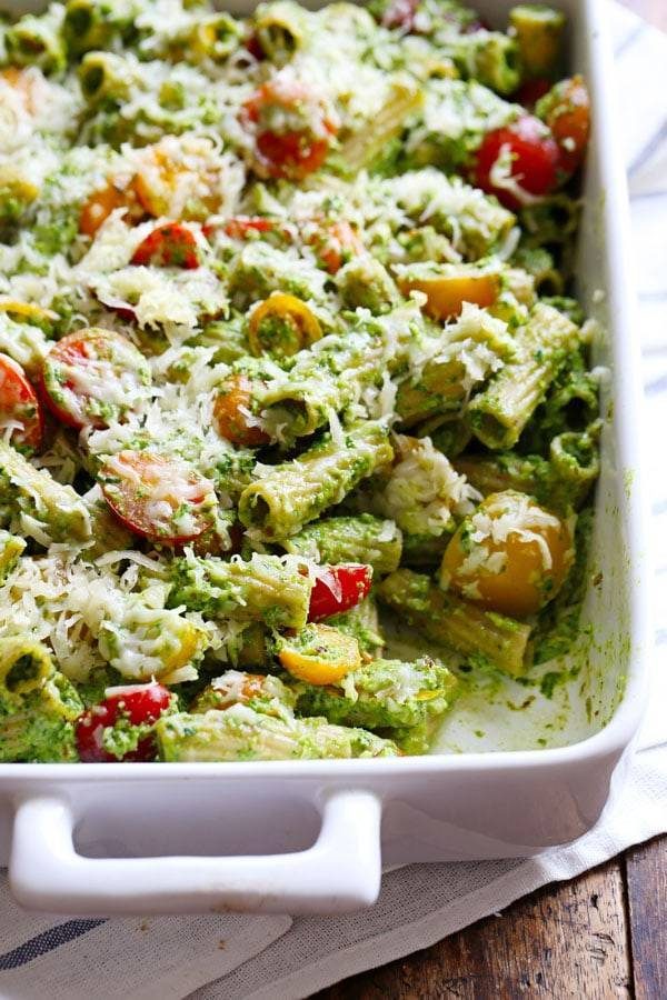 Baked Pesto Rigatoni in a white baking dish.