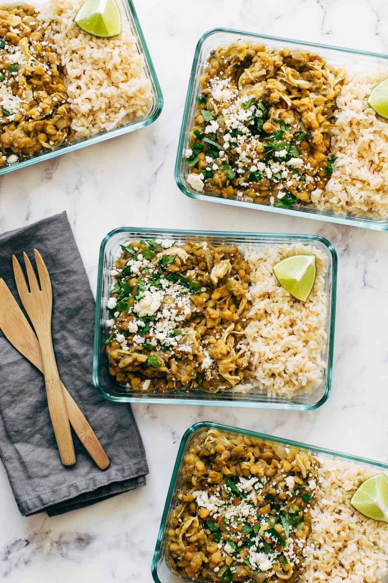 Chicken and lentil rice bowls in containers.