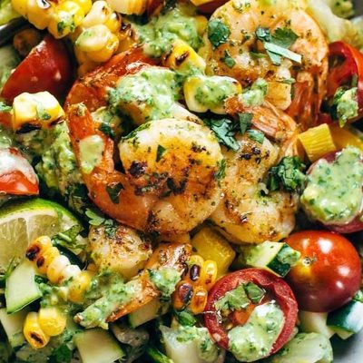 Detox Summer Salad in a bowl with fork.