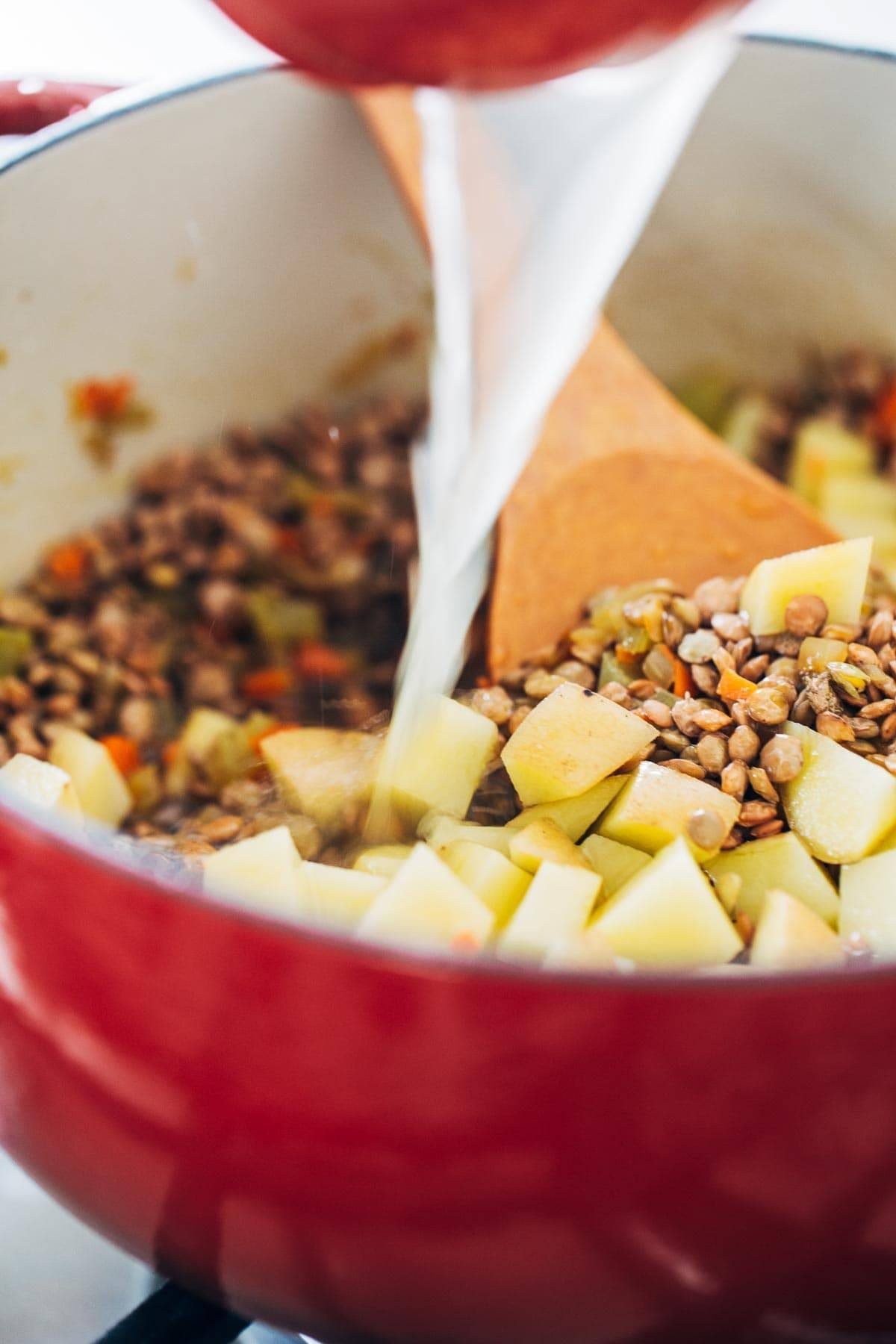 Dutch oven with lentils and potatoes.