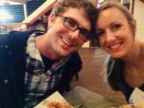 Man and woman smiling.