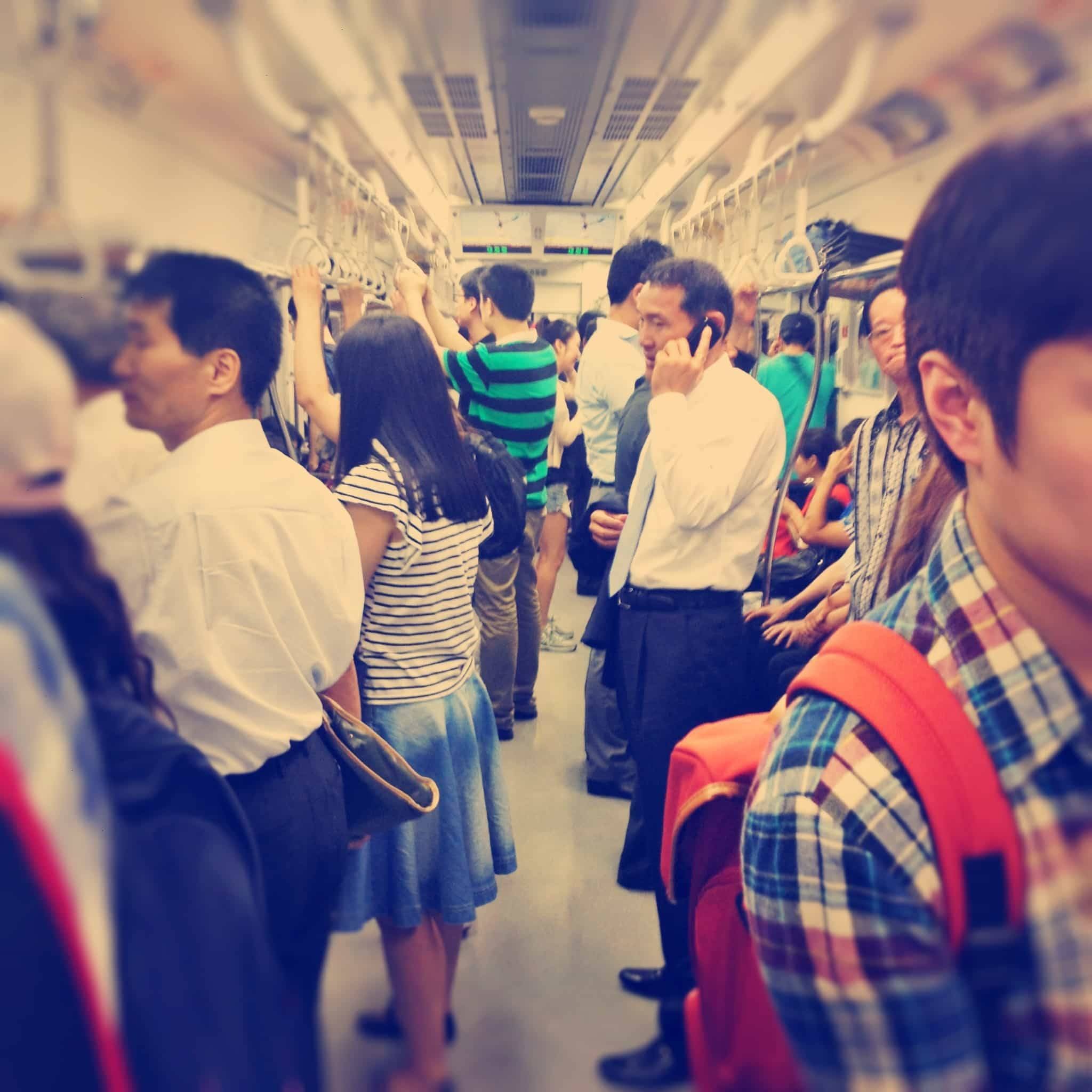 Train in Seoul filled with people.