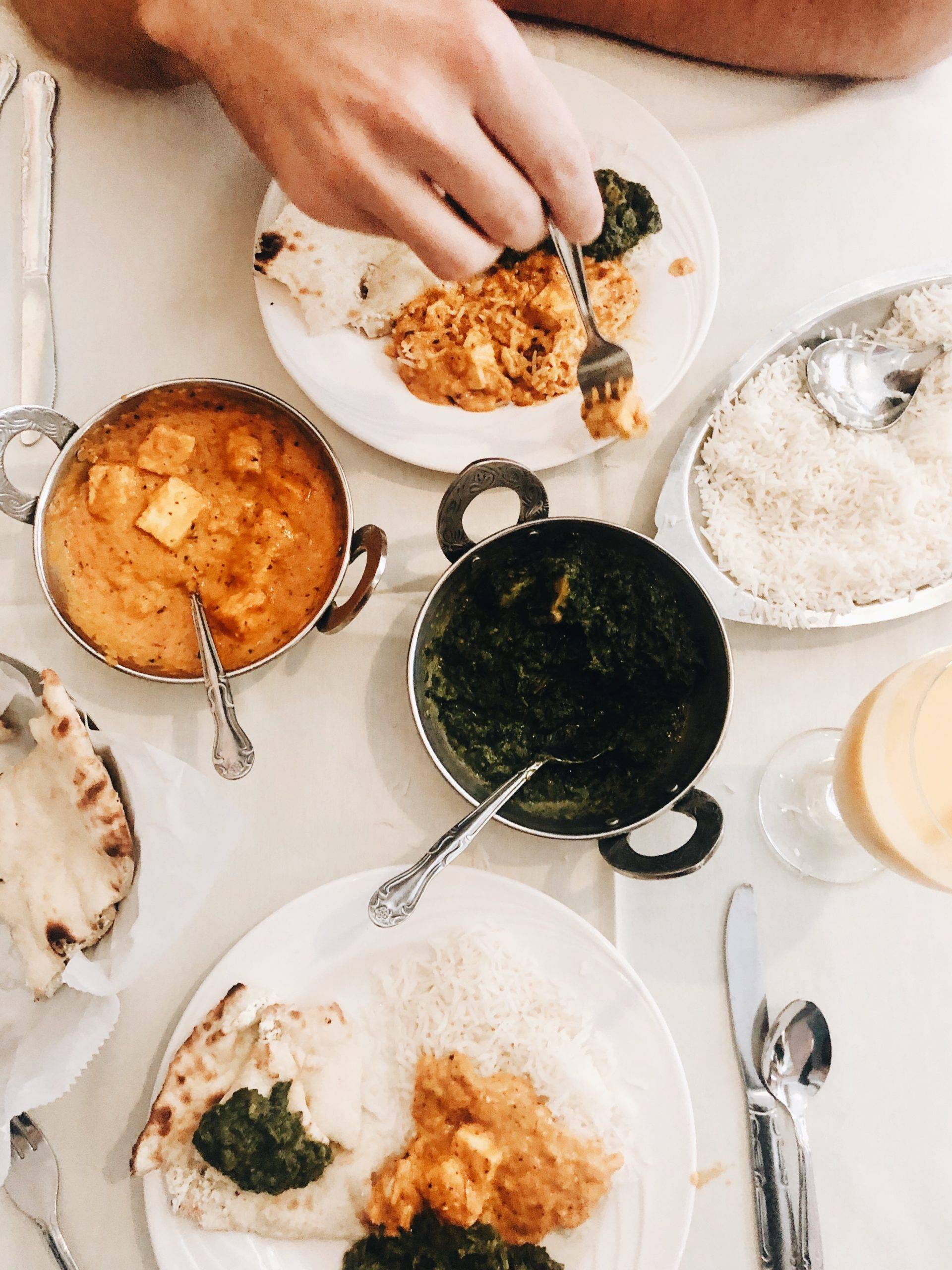 Aerial view of a table of Indian food.