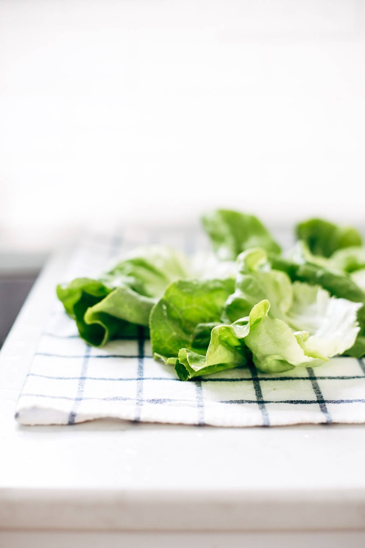 Creamy Miso Peanut Chicken Lettuce Wraps - grilled chicken and juicy grapes tossed with a simple creamy miso-peanut sauce. Super easy and healthy recipe! | pinchofyum.com