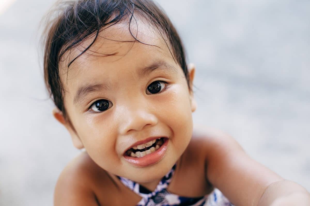 Child looking at the camera.