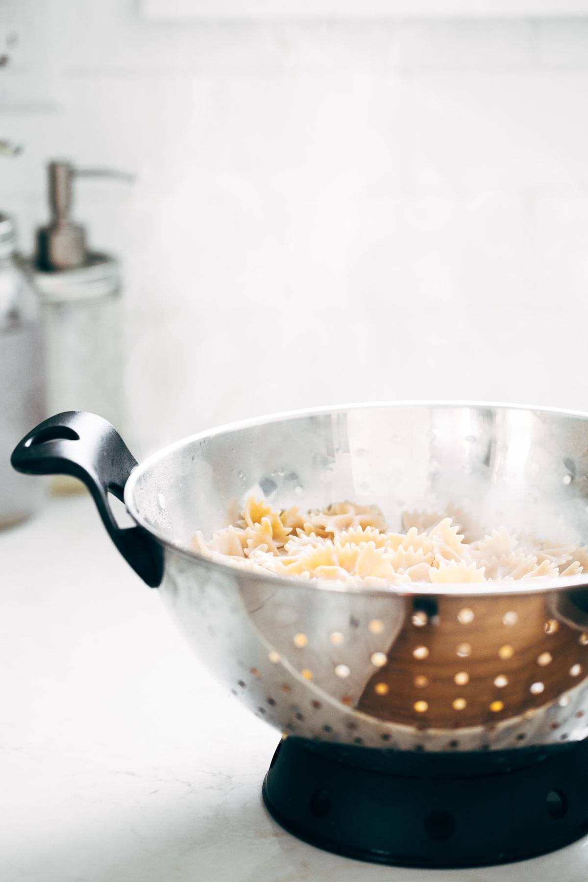Noodles in a strainer.